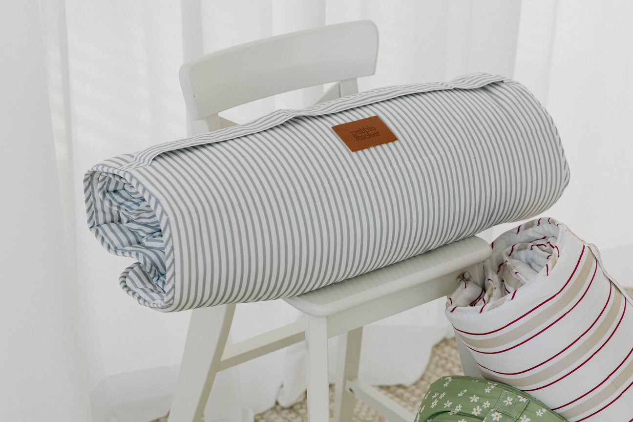 The Journey of Creating Our Cotton Nap Mat - pebble stacker